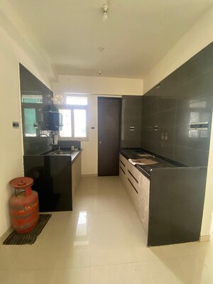 Kitchen in 4 BHK Apartment at Pharande Puneville, Punawale – for Rent