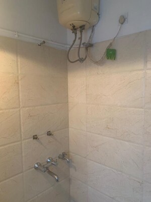 Bathroom in 4 BHK Builder Floor at Kalkaji – for Sale