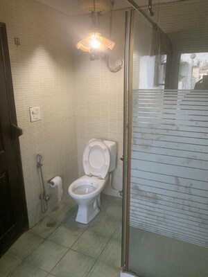 Bathroom in 4 BHK Builder Floor at Kalkaji – for Sale