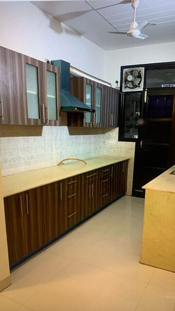 Kitchen in 3 BHK Apartment at Golden Sand Apartments, Dhakoli – for Sale