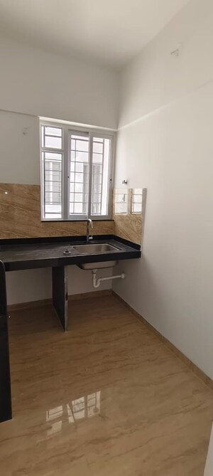 Kitchen in 2 BHK Apartment at Kumar Megapolis Saffron, Hinjewadi – for Rent