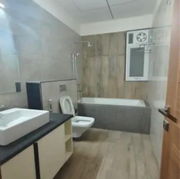 Bathroom in 4 BHK Apartment at Uchdpl Veridia Oakwood Enclave, Wave City – for Rent