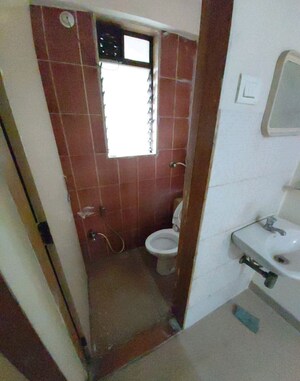 Bathroom in 1 BHK Apartment at Jeevansheela CHS, Bandra East – for Rent