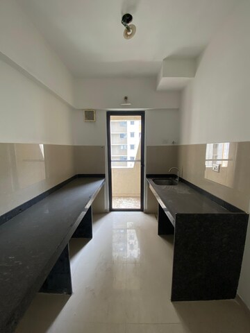 Kitchen in 1 BHK Apartment at Lodha Palava Downtown, Dombivli East – for Sale