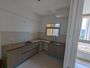 Kitchen in 2 BHK Apartment at Hiranandani Estate Queens Gate, Ghodbunder Road – for Rent