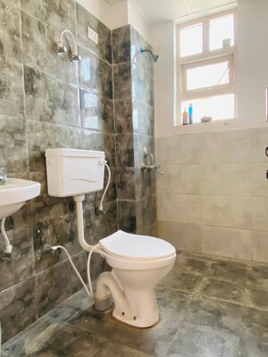 Bathroom in 1 BHK Apartment at Auric City Homes, Sector 82 – for Rent