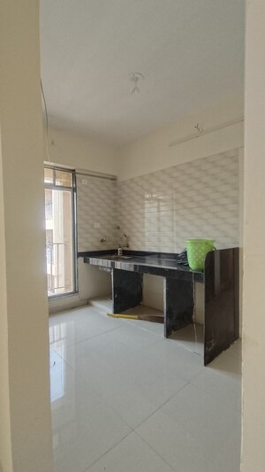 Kitchen in 1.5 BHK Apartment at Lodha Casa Rio, Dombivli East – for Rent