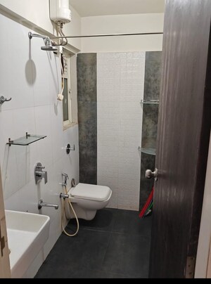 Bathroom in 1 BHK Apartment at Gurukrupa Marina Enclave, Malad West – for Rent