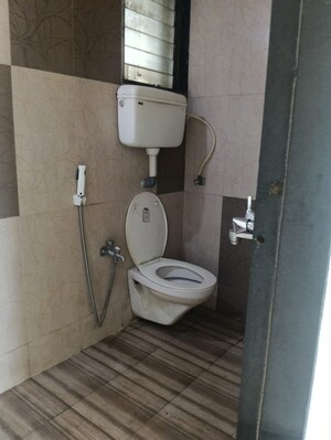 Bathroom in 2 BHK Apartment at Kopar Khairane – for Sale