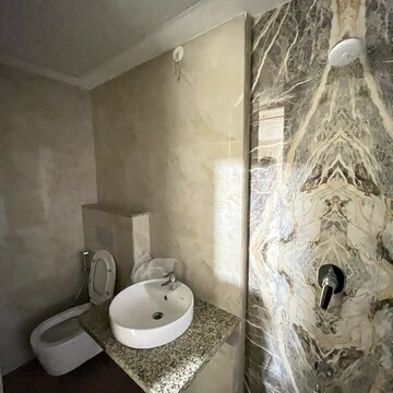 Bathroom in 2.5 BHK Apartment at Gundecha Premiere, Janupada – for Rent