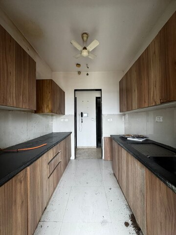 Kitchen in 2 BHK Apartment at Lodha Vivant, Ghodbunder Road – for Rent