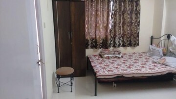 Bedroom in 2 BHK Apartment at Woodland Avenue, Kothrud – for Rent