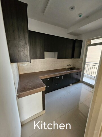 Kitchen in 3 BHK Apartment at ATS Allure, Sector 22d Yamuna Expressway – for Rent