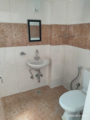 Bathroom in 2.5 BHK Apartment at Unique Sapphire, Mohanpura – for Rent