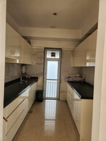 Kitchen in 2 BHK Apartment at Ruparel Ariana, Parel – for Rent
