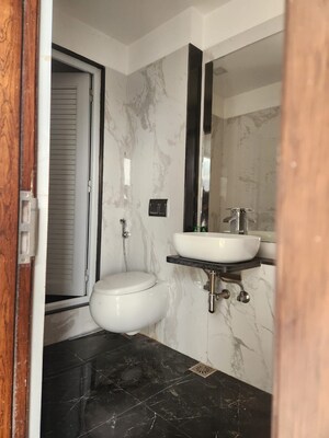 Bathroom in 2 BHK Apartment at Ruparel Ariana, Parel – for Rent