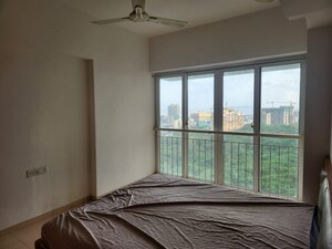 Bedroom in 2 BHK Apartment at Ruparel Ariana, Parel – for Rent