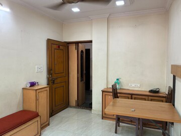 Living Room in 1 BHK Apartment at Lalani Residency, Kavesar – for Rent