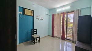 Living Room in 2 BHK Apartment at Shree Siddhivinayak CHS Borivali, Borivali West – for Rent