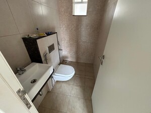 Bathroom in 2 BHK Apartment at Godrej Green Vistas, Mahalunge – for Rent