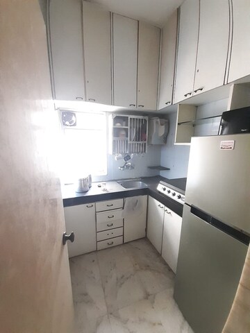 Kitchen in 1 BHK Apartment at Poornima Apartments, Colaba – for Rent