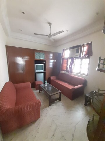 Living Room in 1 BHK Apartment at Poornima Apartments, Colaba – for Rent