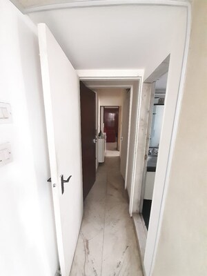 Building Lobby in 1 BHK Apartment at Poornima Apartments, Colaba – for Rent