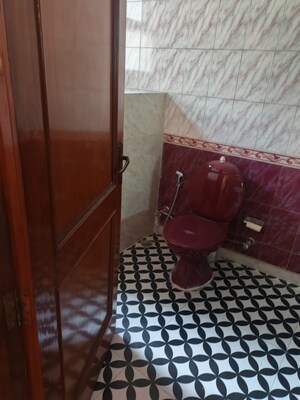 Bedroom in 4 BHK Builder Floor at Sarvodaya Enclave – for Rent