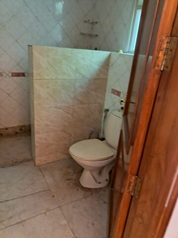 Bathroom in 4 BHK Builder Floor at Sarvodaya Enclave – for Rent