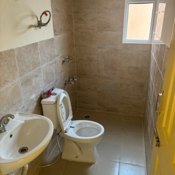 Bathroom in 3 BHK Apartment at Wave Dream Homes, Ram Nagar – for Rent