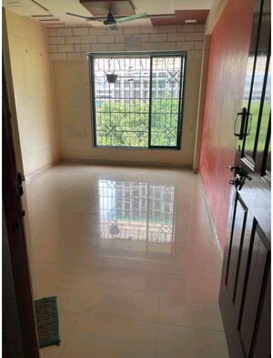 Room in 2 BHK Apartment at Puraniks Kavya Dhara CHS, Dhokali – for Rent