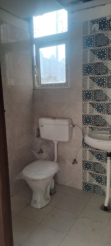 Bathroom in 2 BHK Apartment at Signature Global Proxima, Sector 89 – for Rent