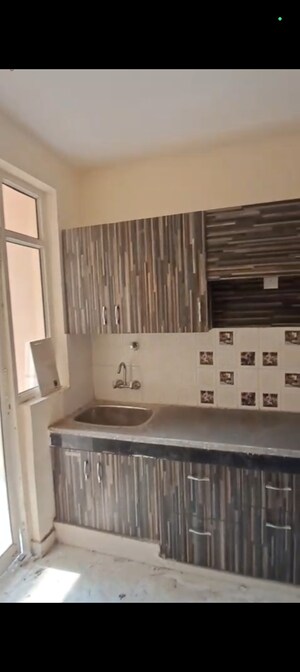 Kitchen in 2 BHK Apartment at Eureka Diya Green City, Raj Nagar Extension – for Sale