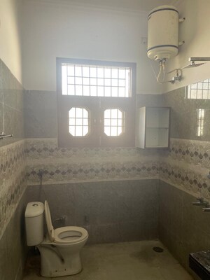 Bedroom in 3 BHK Builder Floor at Sector 15 – for Rent