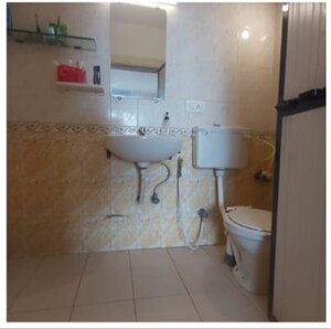 Bathroom in 4 BHK Apartment at Versova Shubham Karoti CHS, Andheri West – for Sale
