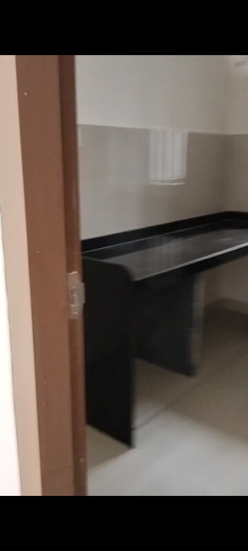 Kitchen in 2 BHK Apartment at Nishuvi Rehab Phase, Worli – for Rent