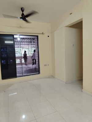 Living Room in 2 BHK Apartment at Amrut Dhara Complex CHS, Kharghar Sector 20 – for Rent