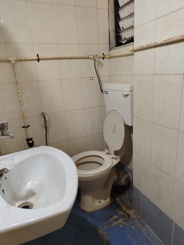 Bathroom in 2 BHK Apartment at Amrut Dhara Complex CHS, Kharghar Sector 20 – for Rent