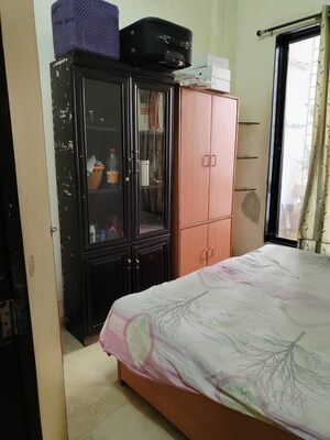 Bedroom in 2 BHK Apartment at Swarna CHS, Kharghar Sector 7 – for Rent