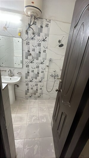 Bathroom in 3 BHK Builder Floor at Dhakoli – for Rent