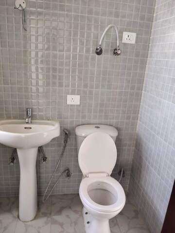 Bathroom in 3 BHK Apartment at Amrapali Terrace Homes, Tech Zone 4 Greater Noida – for Rent