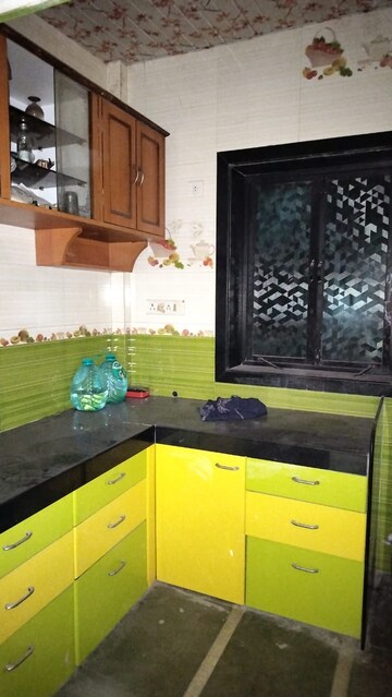 Kitchen in 2 BHK Apartment at Sudama Apartment, Kalwa – for Rent