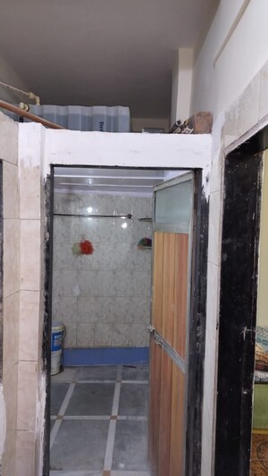 Bathroom in 2 BHK Apartment at Sudama Apartment, Kalwa – for Sale