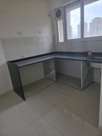 Kitchen in 3 BHK Apartment at Vijay Orovia, Ghodbunder Road – for Sale