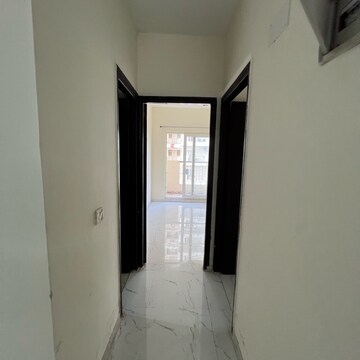 Building Lobby in 2 BHK Apartment at Pivotal Riddhi Siddhi, Sector 99 – for Rent