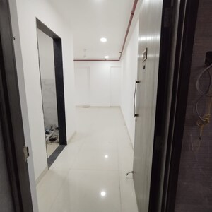 Building Lobby in 2 BHK Apartment at Naman Habitat, Andheri West – for Rent