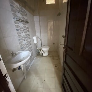 Bathroom in 2 BHK Builder Floor at Chattarpur – for Rent