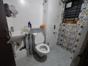 Bathroom in 3 BHK Apartment at Jyoti Nagar – for Rent