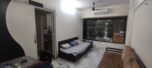 Living Room in 1 BHK Apartment at Tranquility Apartments, Andheri West – for Sale