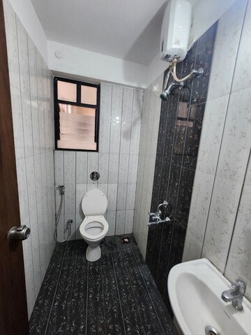 Bathroom in 1 BHK Apartment at Oxy Beaumonde, Viman Nagar – for Rent